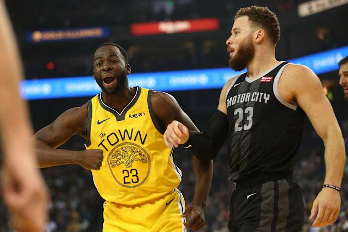Mar 24, 2019; Oakland, CA, USA; Golden State Warriors forward Draymond Green (23) reacts after being called for a foul next to Detroit Pistons forward Blake Griffin (23) in the first quarter at Oracle Arena. Mandatory Credit: Cary Edmondson-USA TODAY Sports